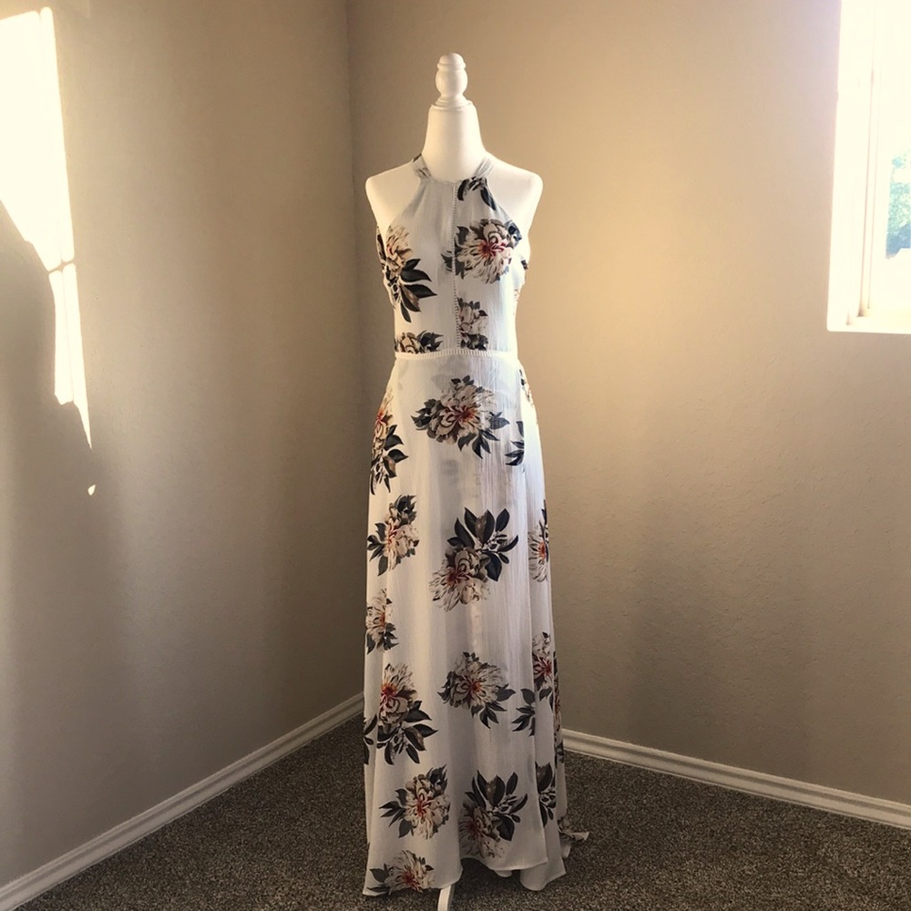 Beautiful white and floral float maxi dress